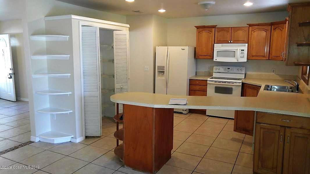 1019 Cromey Road Northeast Palm Bay, FL 32905 - Photo 5 of 27 20180418161453988977000000-o