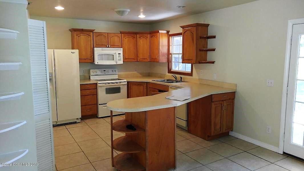 1019 Cromey Road Northeast Palm Bay, FL 32905 - Photo 6 of 27 20180418161442689717000000-o