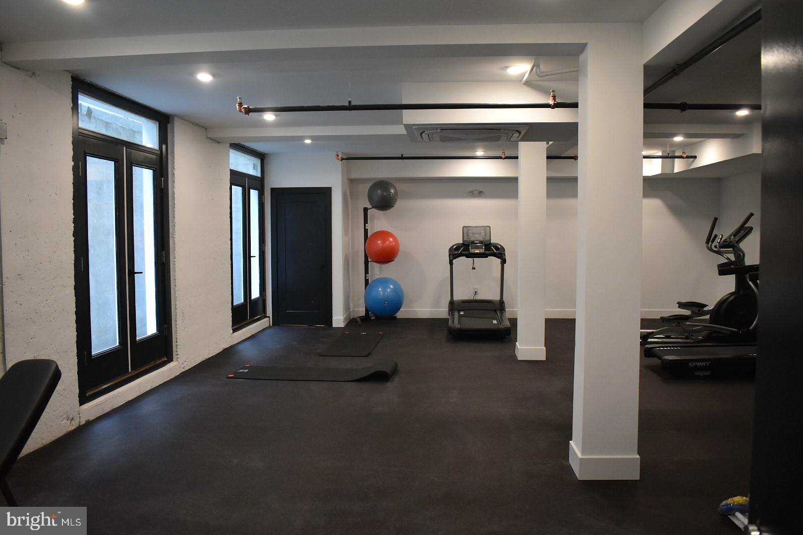 3037 Richmond Street, Unit 107 Philadelphia, PA 19134 - Photo 15 of 15 a view of a room with gym equipment