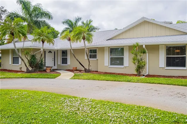 a view of outdoor space yard and front view of a house