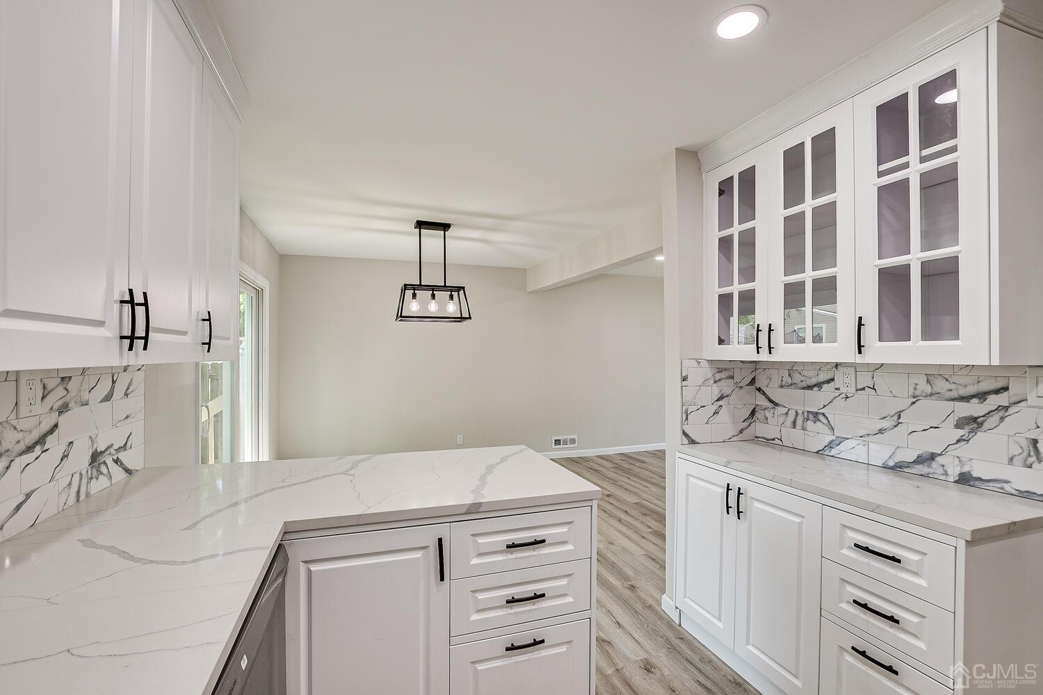 8 Amman Road Edison, NJ 08817 - Photo 25 of 39 a kitchen with a stove and a sink