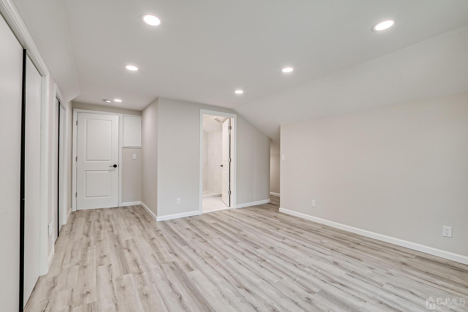 8 Amman Road Edison, NJ 08817 - Photo 27 of 39 a view of hallway with wooden floor