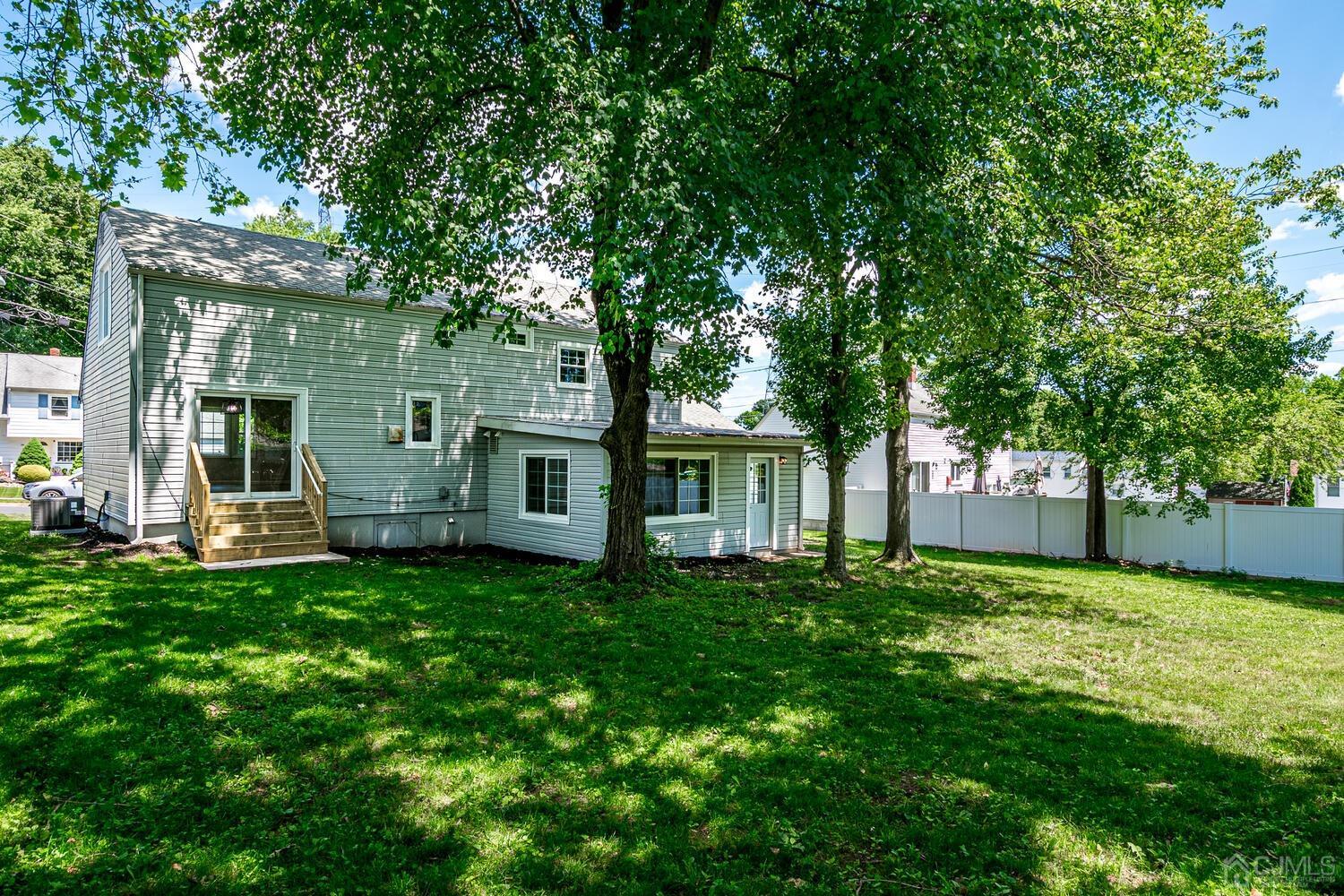 8 Amman Road Edison, NJ 08817 - Photo 37 of 39 a view of a house with backyard and garden