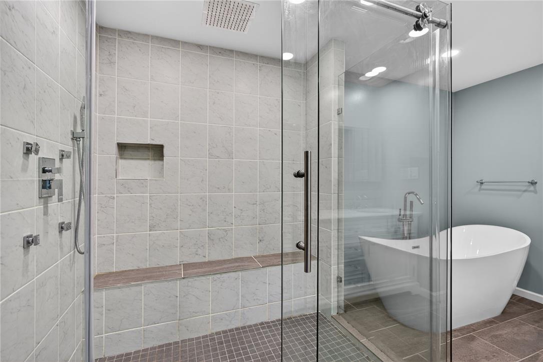 1371 Stoke Park Road Bethlehem, PA 18017 - Photo 34 of 55 a bathroom with a bathtub and shower