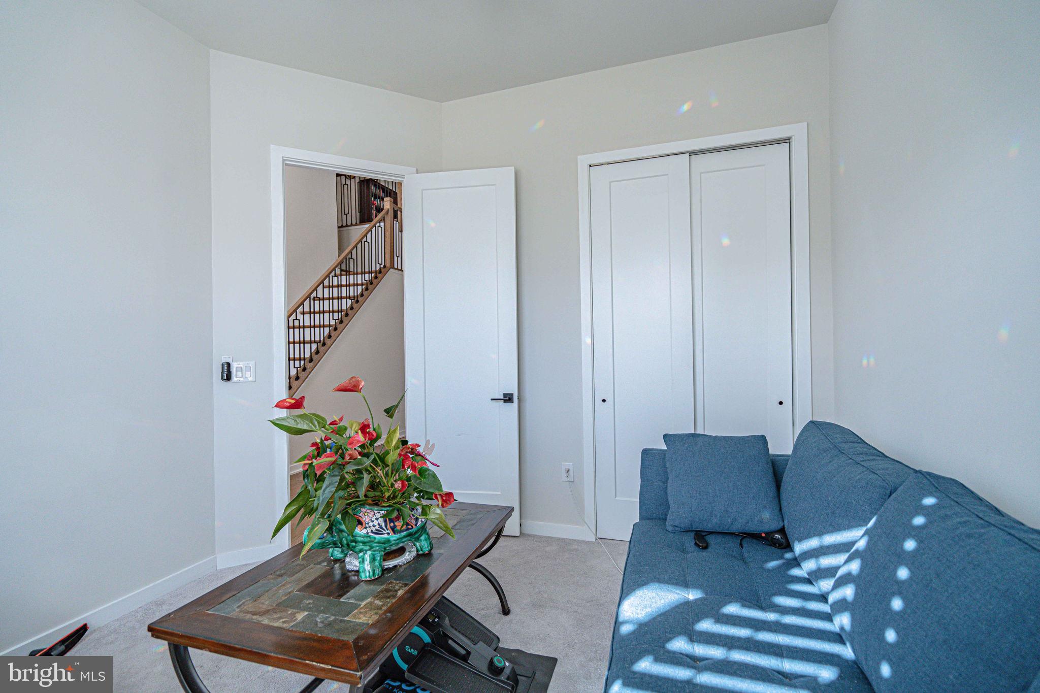 4027 Shef's Way Allentown, PA 18104 - Photo 11 of 80 a living room with furniture and a potted plant