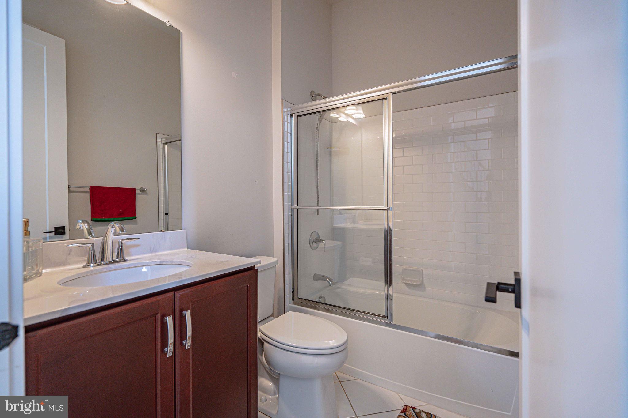 4027 Shef's Way Allentown, PA 18104 - Photo 12 of 80 a bathroom with a sink toilet and shower