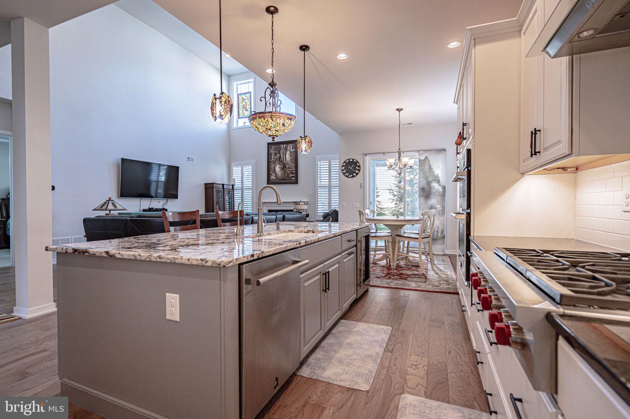 4027 Shef's Way Allentown, PA 18104 - Photo 22 of 80 a kitchen with stainless steel appliances granite countertop a stove and a sink