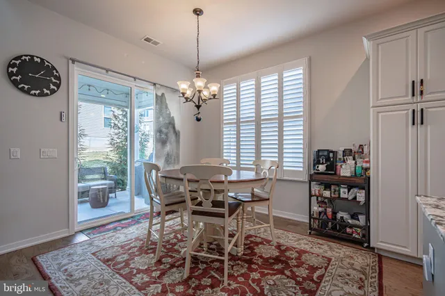 a white toilet sitting next to a small tub