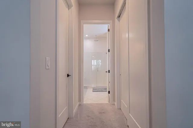 a view of a livingroom with furniture and a flat screen tv