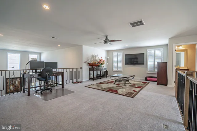a view of a two chairs in the roof deck