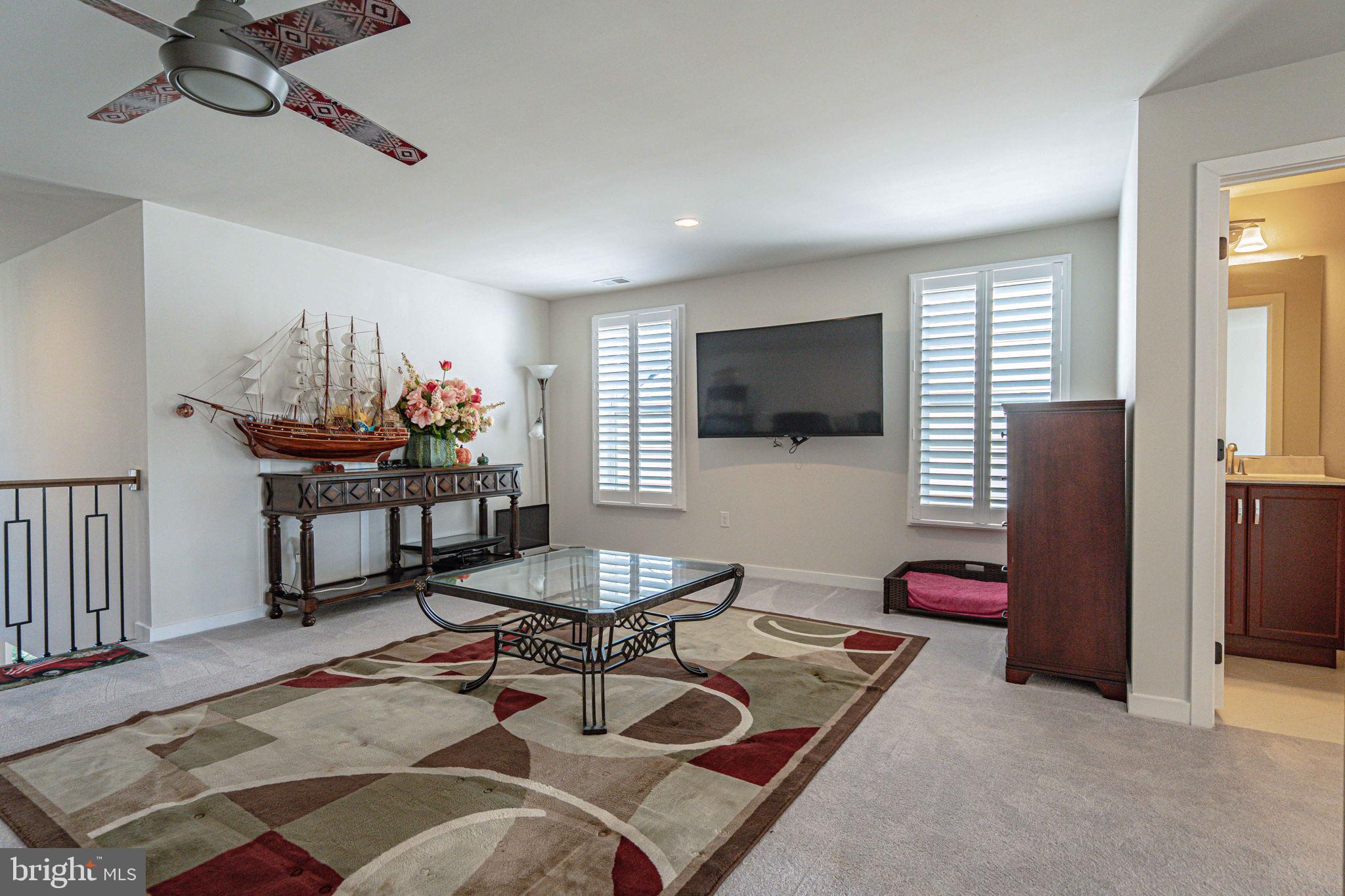 4027 Shef's Way Allentown, PA 18104 - Photo 39 of 80 a living room with furniture and a flat screen tv