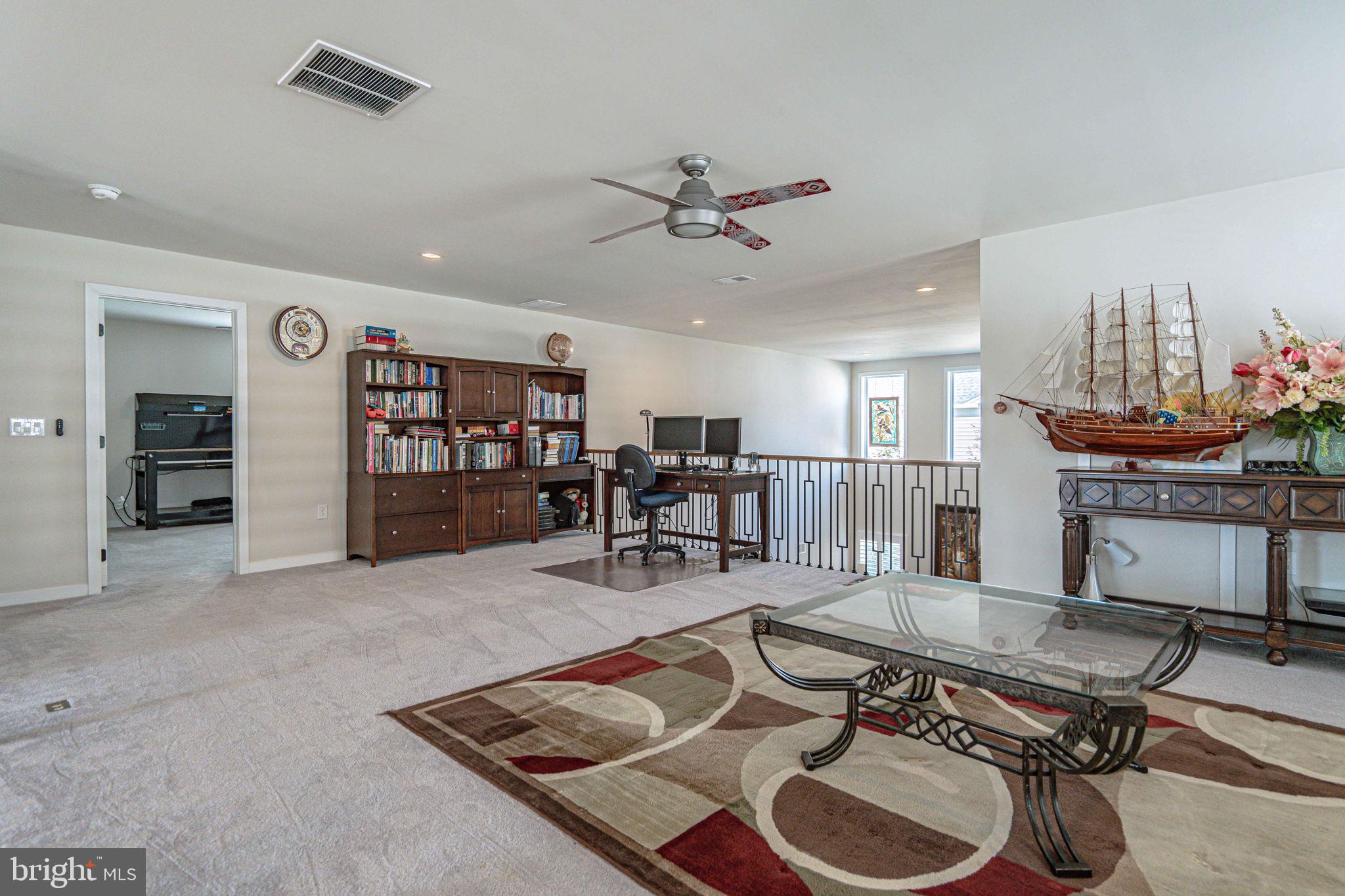 4027 Shef's Way Allentown, PA 18104 - Photo 40 of 80 a living room with furniture and a table