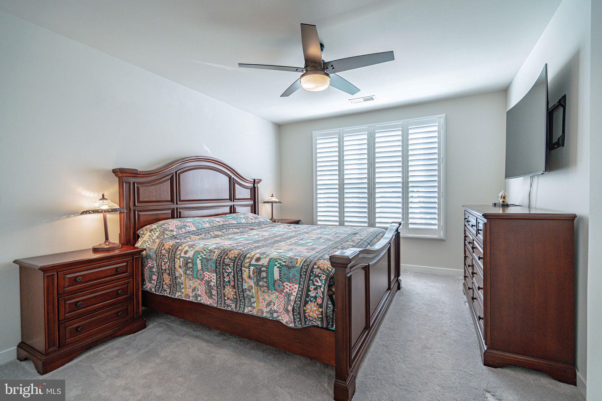 4027 Shef's Way Allentown, PA 18104 - Photo 43 of 80 a bedroom with a bed and a flat screen tv