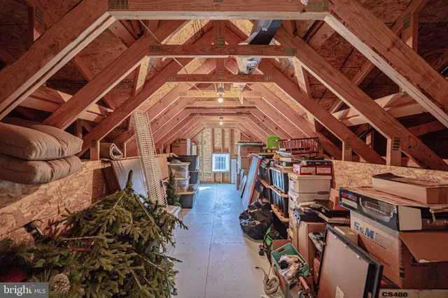 a open kitchen with stainless steel appliances granite countertop a stove and a sink