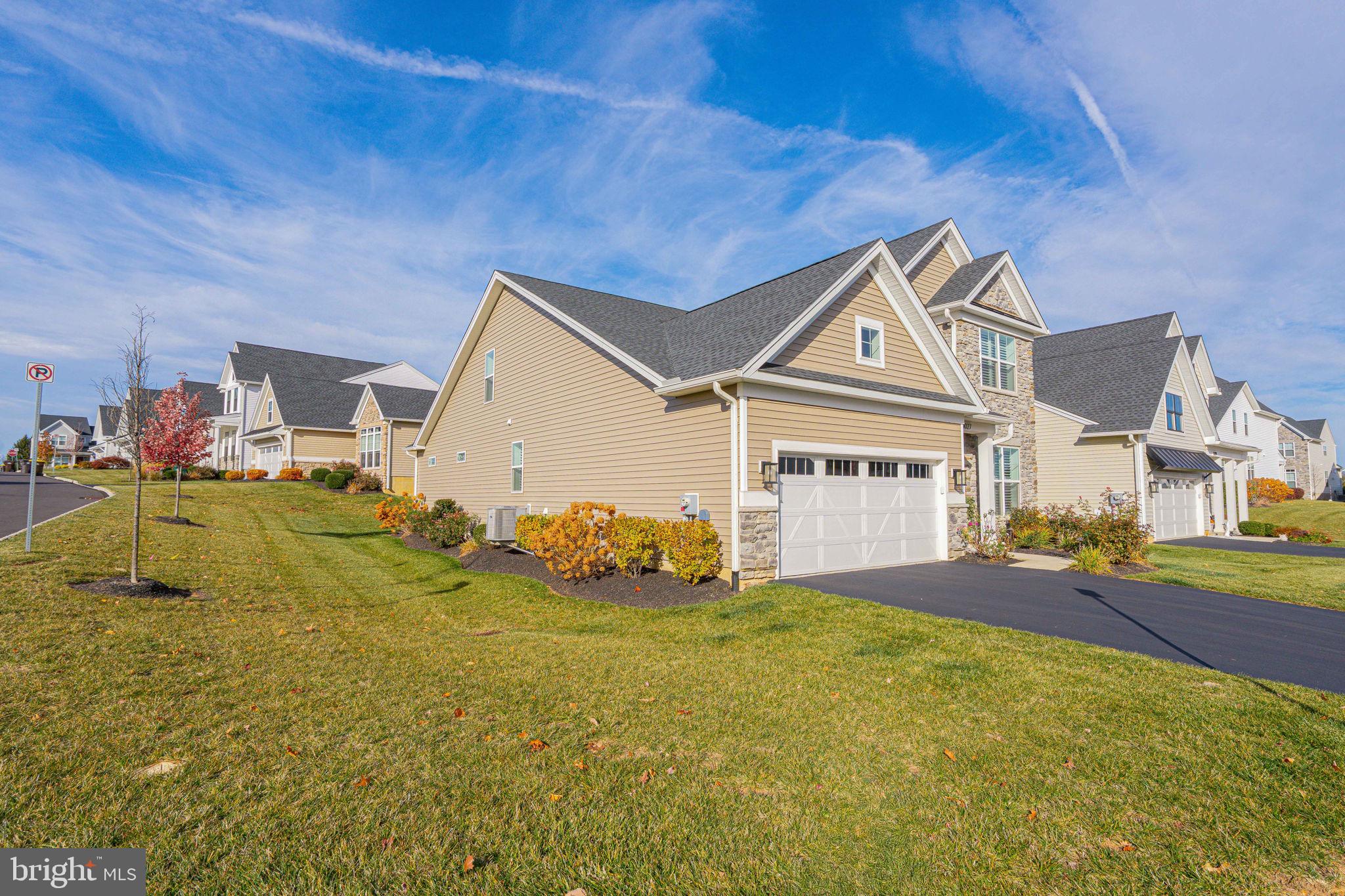 4027 Shef's Way Allentown, PA 18104 - Photo 5 of 80 a view of a house next to a big yard