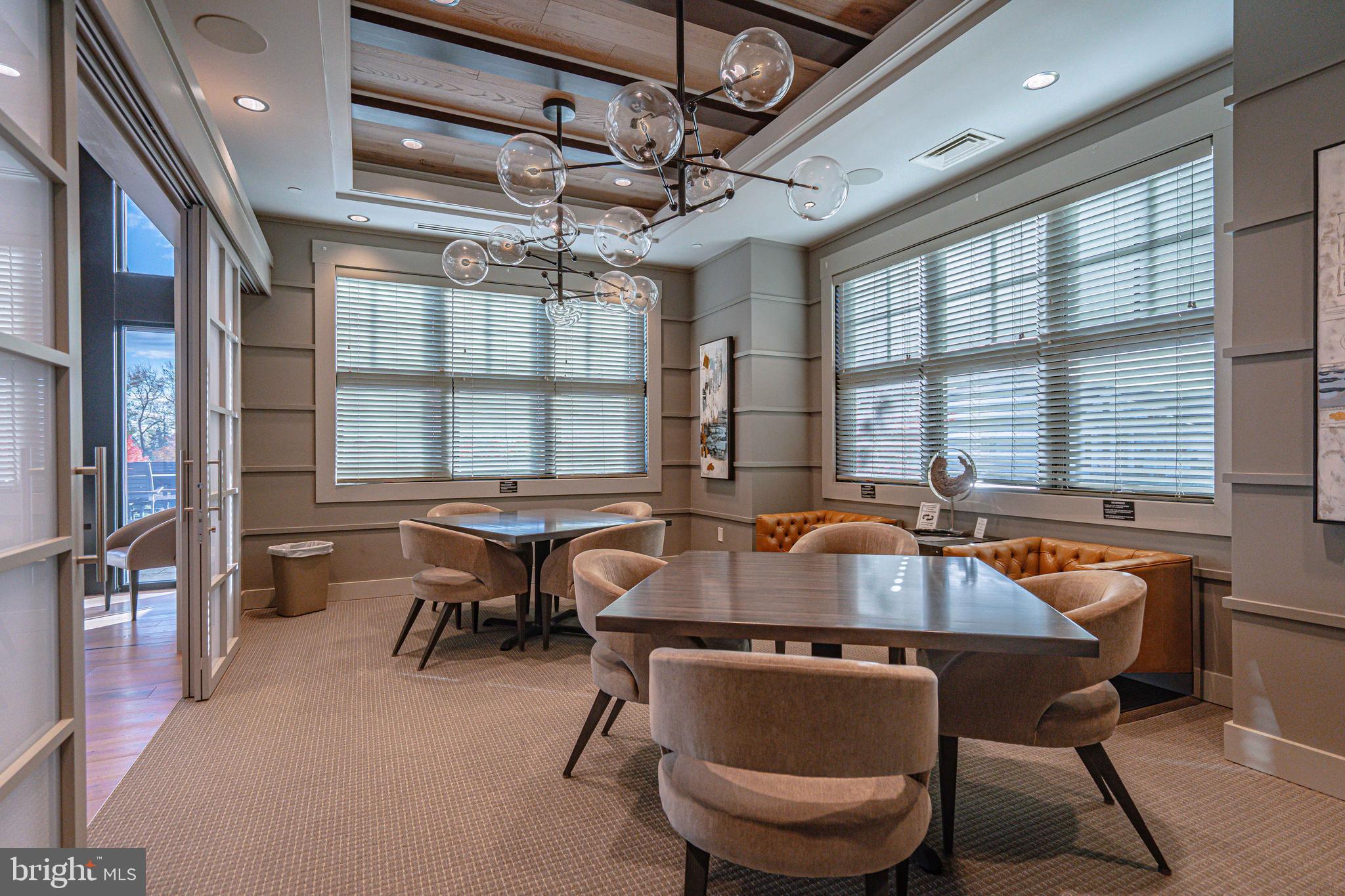 4027 Shef's Way Allentown, PA 18104 - Photo 70 of 80 a table and chairs in a room next to a window