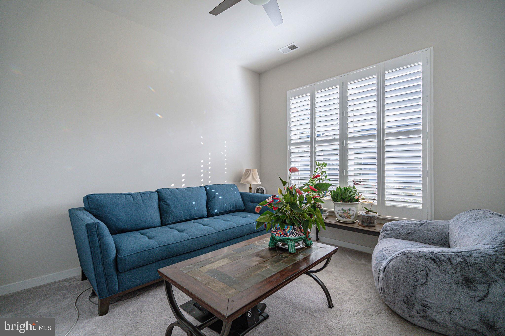 4027 Shef's Way Allentown, PA 18104 - Photo 10 of 80 a living room with furniture and a potted plant