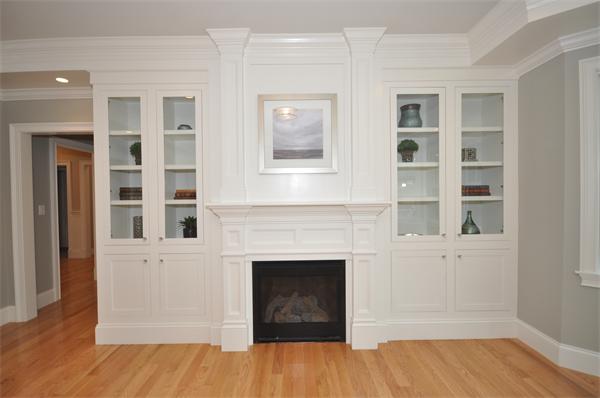 36 Somerset Road Lexington, MA 02420 - Photo 14 of 22 a view of a livingroom with a fireplace and window