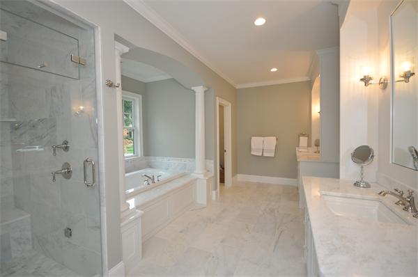 36 Somerset Road Lexington, MA 02420 - Photo 17 of 22 a bathroom with a tub shower a mirror and a sink