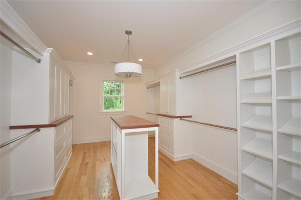 36 Somerset Road Lexington, MA 02420 - Photo 18 of 22 a kitchen with white cabinets and white appliances