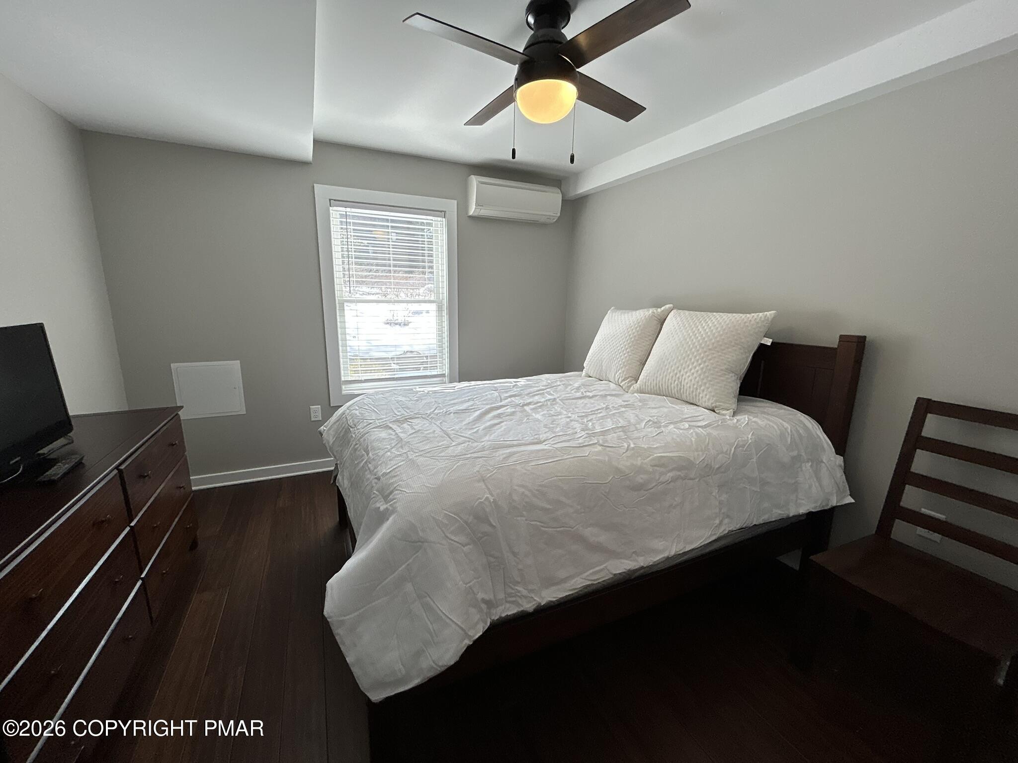 2 Rockridge Road Lake Harmony, PA 18624 - Photo 13 of 19 a bedroom with a bed and a lamp on dresser