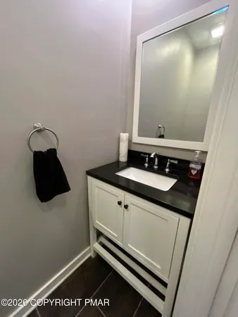 a utility room with dryer washer and a window