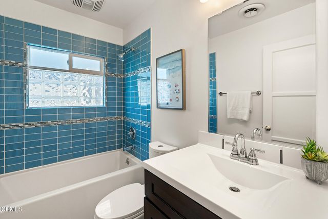 a bathroom with a sink and a bathtub