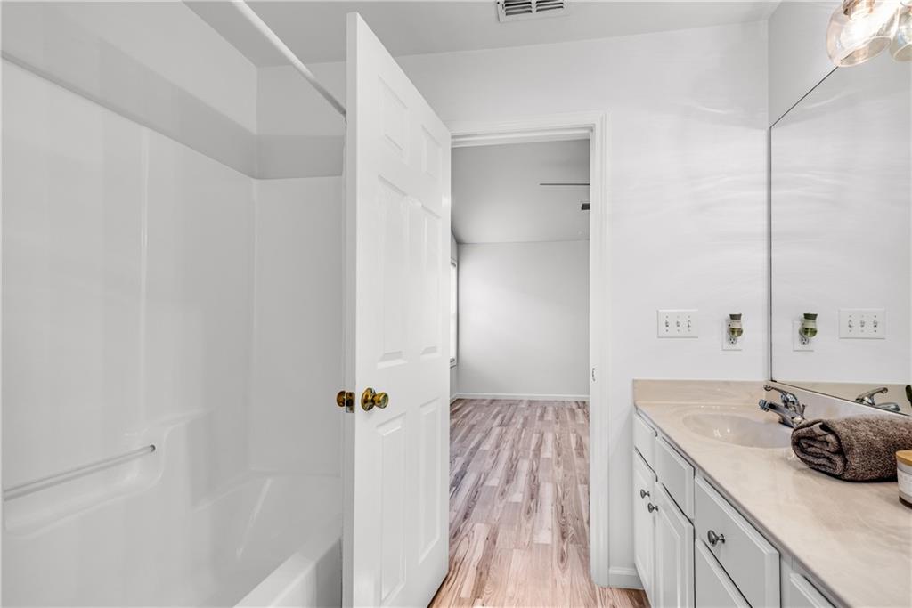 125 Pine Ridge Trace Athens, GA 30605 - Photo 16 of 28 a bathroom with a sink and mirror