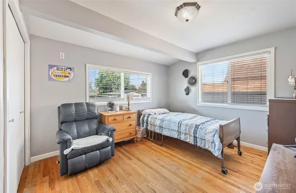 a bed room with a bed and a couch