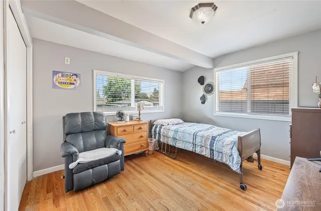 a bed room with a bed and a couch