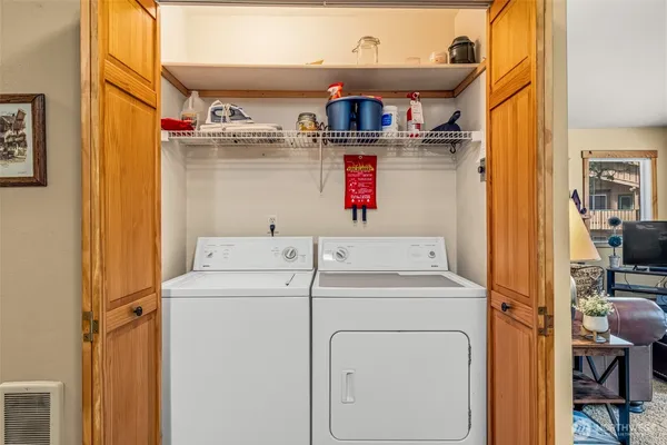 a utility room with dryer and washer
