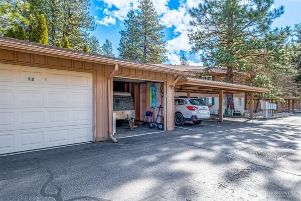 a view of a car park in front of house