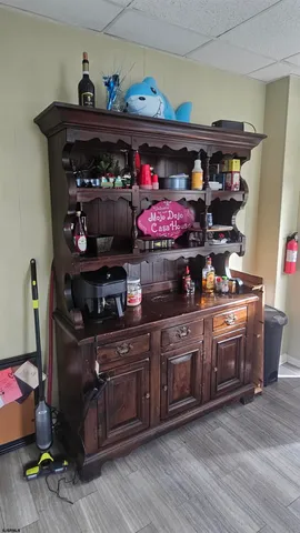 a kitchen with stainless steel appliances granite countertop a stove and wooden cabinets