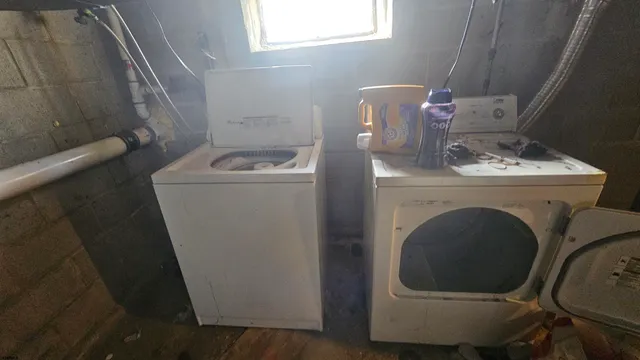 a utility room with dryer and washer