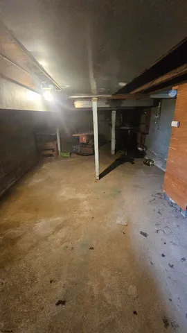 a bathroom with a sink mirror and toilet