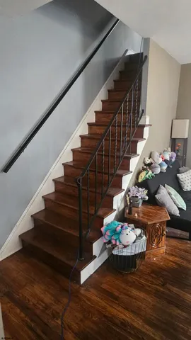 a view of entryway with wooden floor