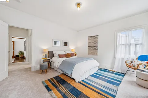 a bathroom with a toilet a sink and a mirror
