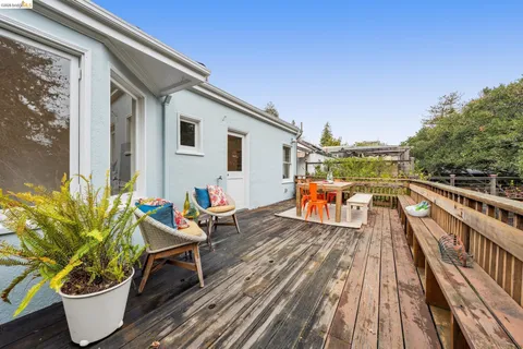 a bedroom with a bed and lamp