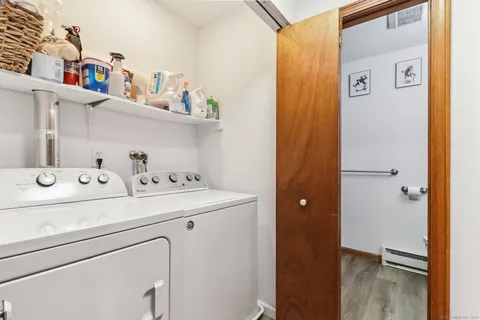 a utility room with dryer and washer