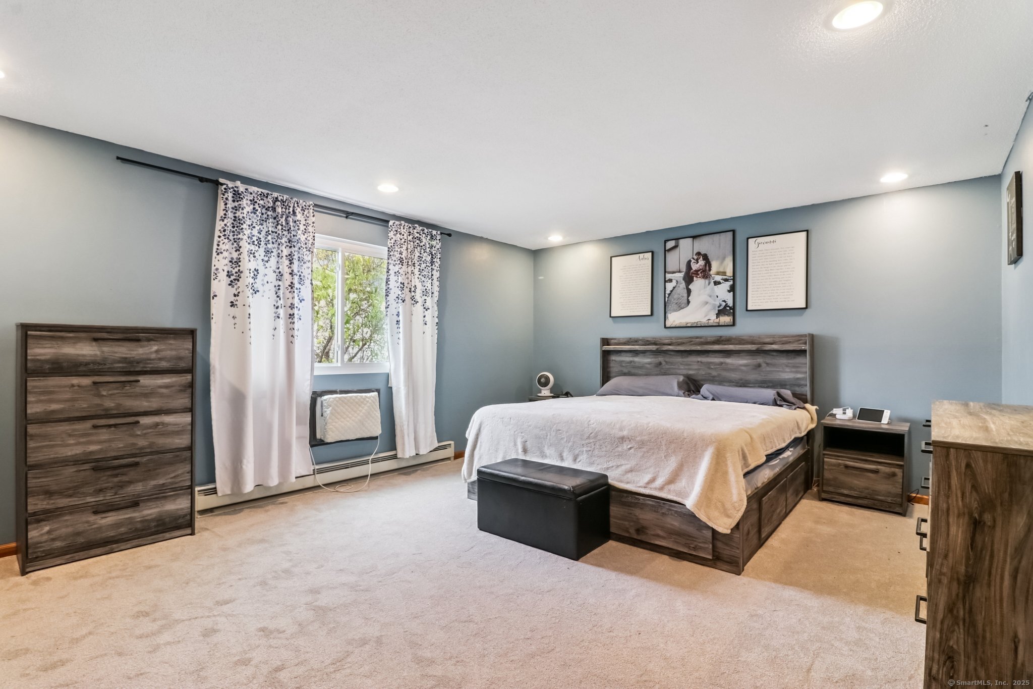 565 Clark Avenue, Unit 18 Bristol, CT 06010 - Photo 18 of 25 a bedroom with a bed and a window