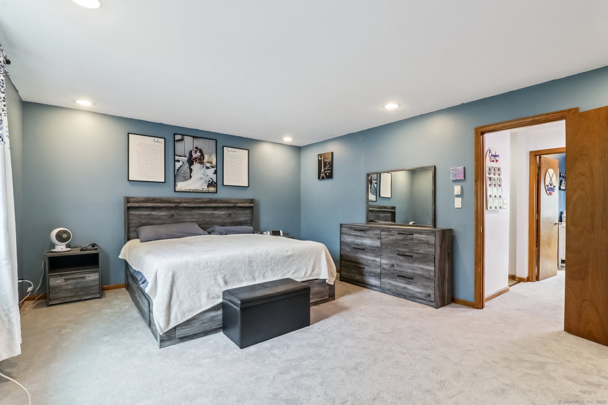 565 Clark Avenue, Unit 18 Bristol, CT 06010 - Photo 20 of 25 a bedroom with a bed and a television