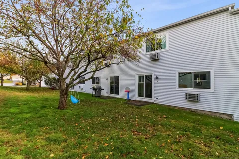 a front view of house with yard