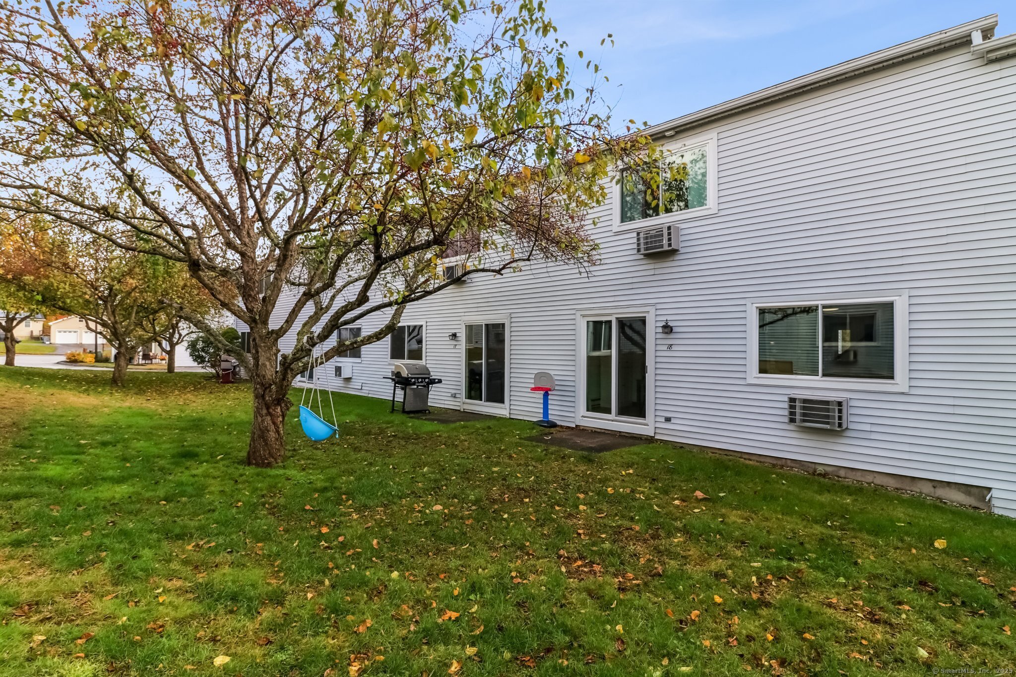 565 Clark Avenue, Unit 18 Bristol, CT 06010 - Photo 21 of 25 a front view of house with yard