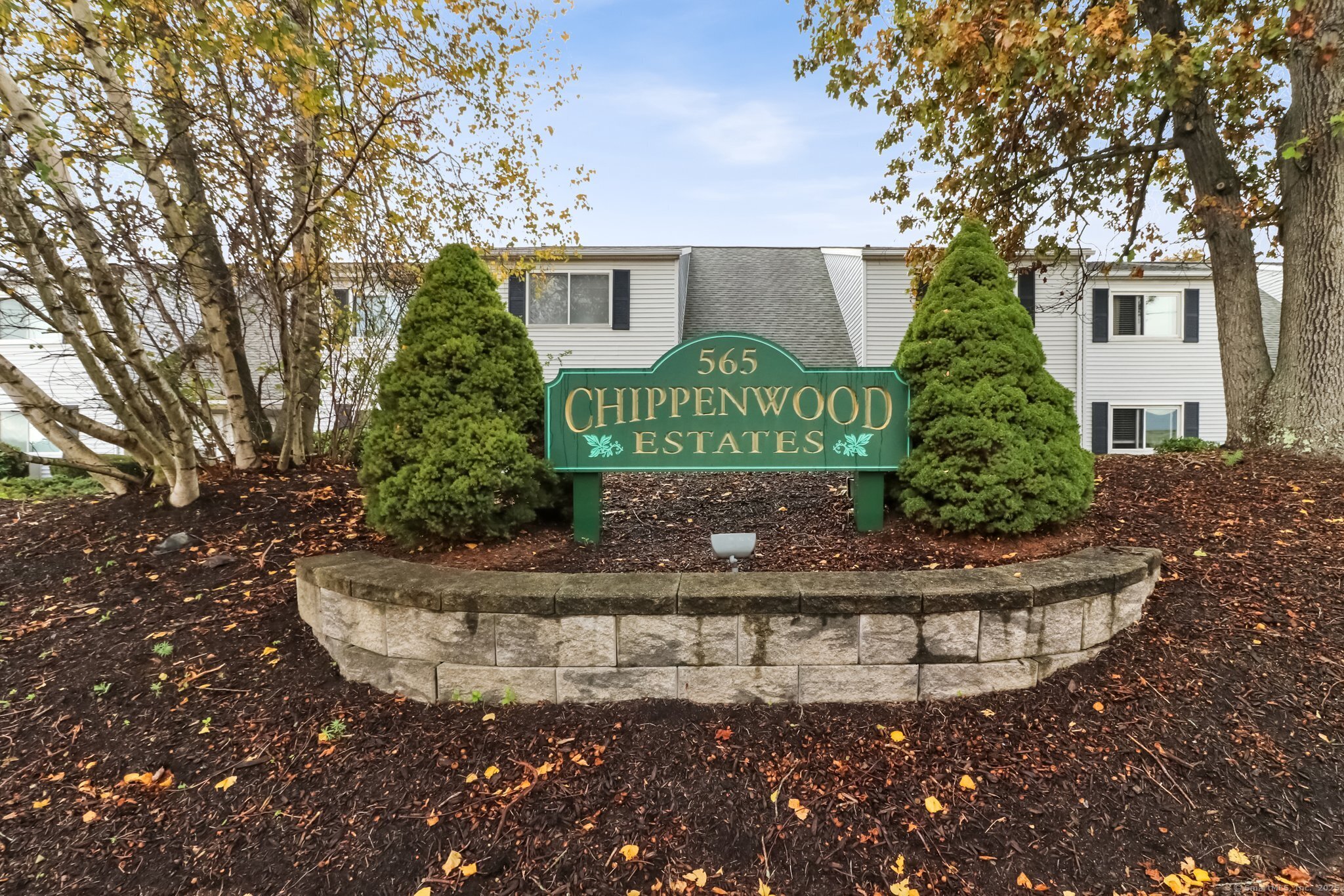 565 Clark Avenue, Unit 18 Bristol, CT 06010 - Photo 4 of 25 a sign that is on the side of a road