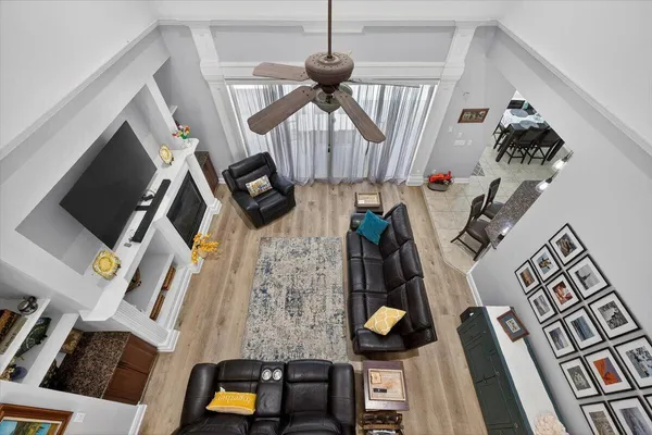 a kitchen with white cabinets and appliances