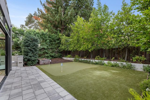 a view of a chair and table in the balcony
