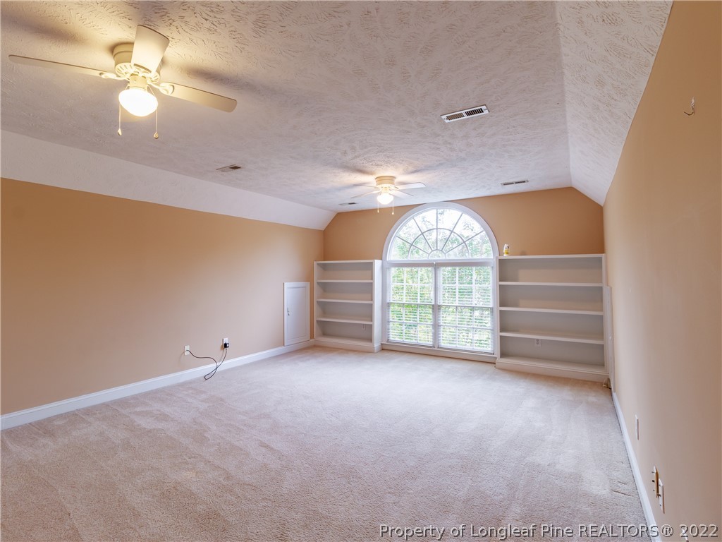 6915 Surrey Road Fayetteville, NC 28306 - Photo 30 of 37 wooden floor in an empty room with a window