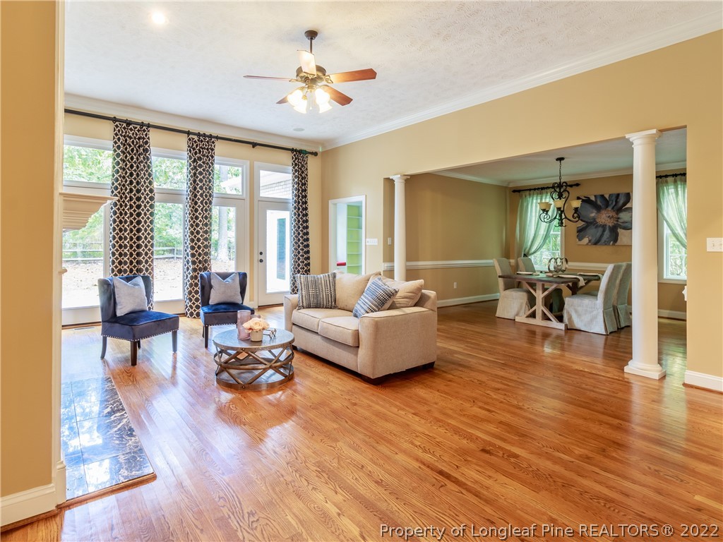 6915 Surrey Road Fayetteville, NC 28306 - Photo 4 of 37 a living room with furniture and a large window