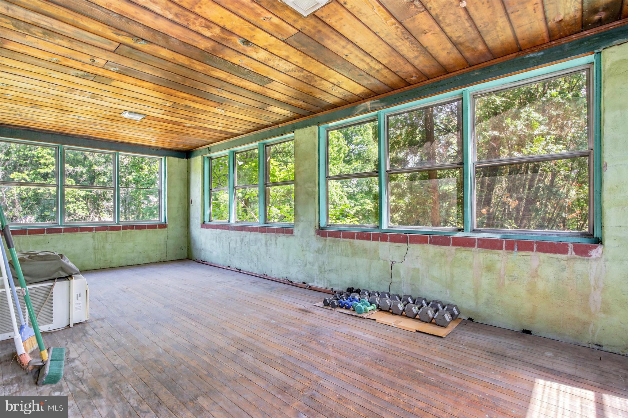 2206 Lenhart Road Colmar, PA 18915 - Photo 9 of 39 Huge enclosed porch w/views of yard & wood ceiling
