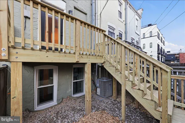a view of balcony with washer and dryer